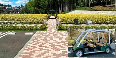 平坦な墓域の風景とカートの写真